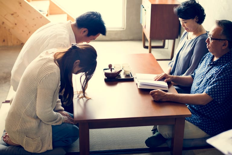 Japanese family paying respect